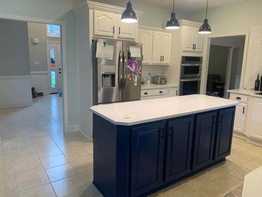 Spray finish cabinets in Sherwin Williams White Flour and Salty Dog