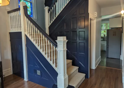 100 year old foyer repainted in Benjamin Moore Hale Navy