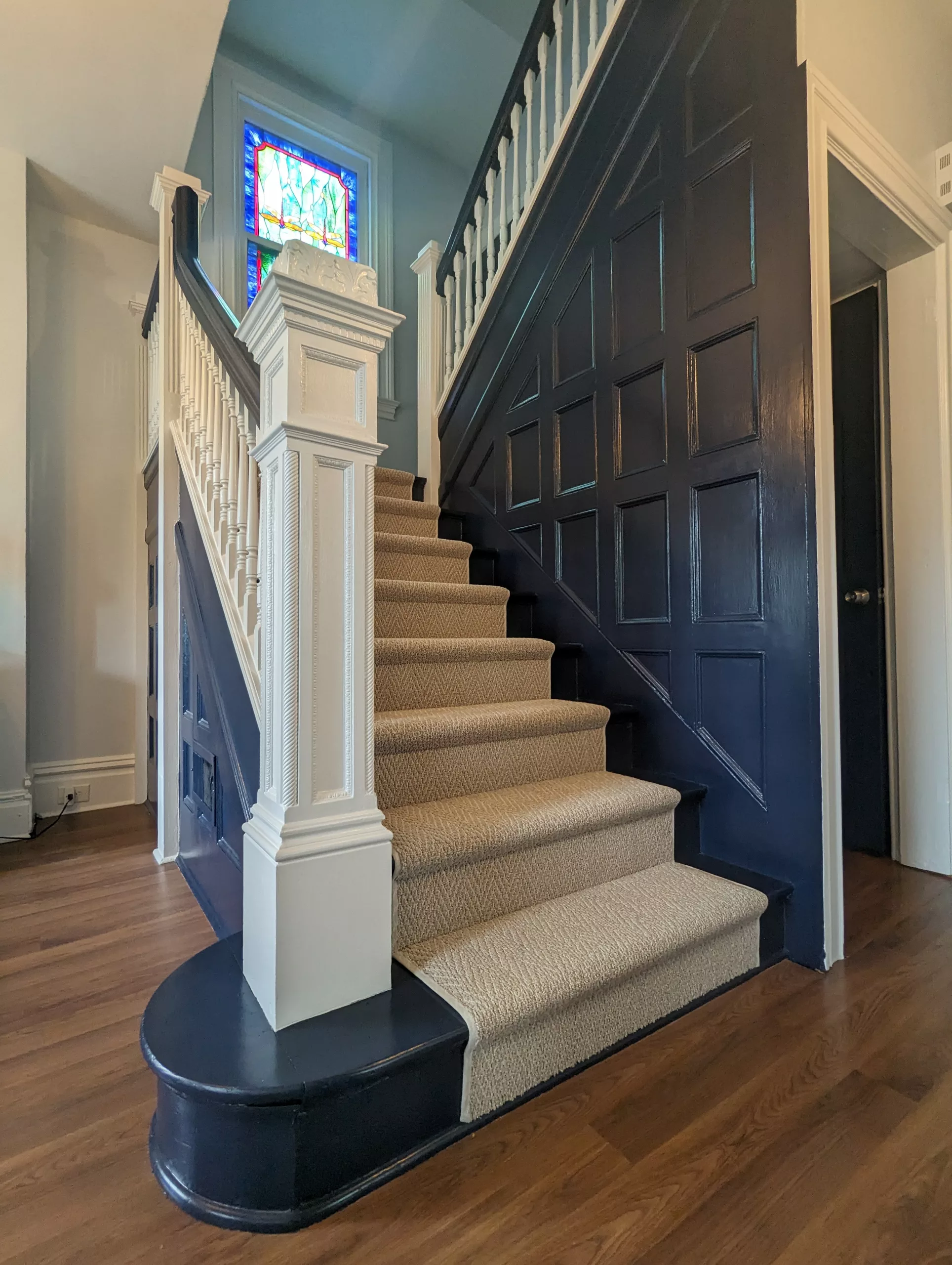 100 year old foyer repainted in Benjamin Moore Hale Navy