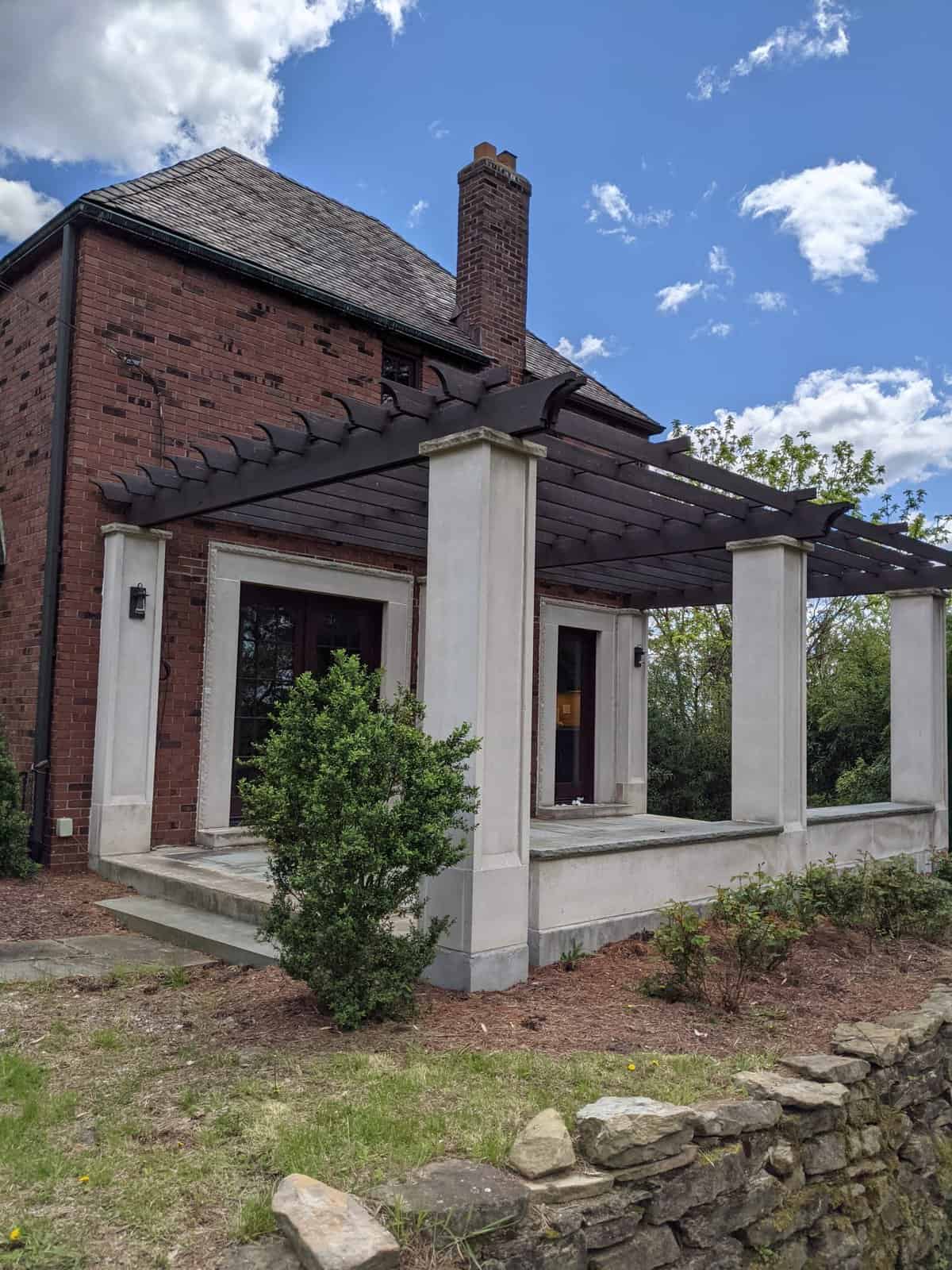 Stained pergola helps protect and elongate the life of the wood